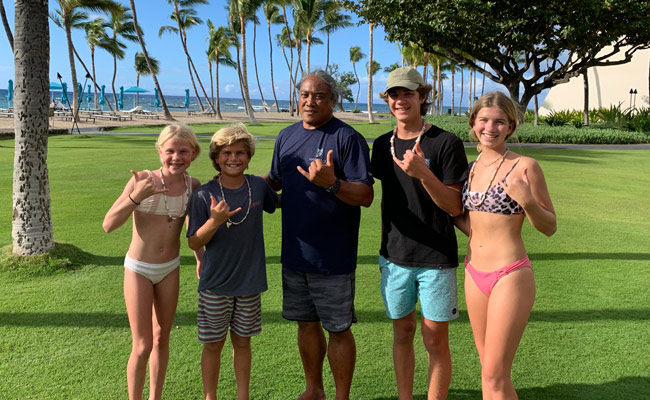 Uncle George and kids after making Puka Shell necklaces